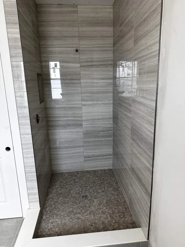 Gray Shower by KR Flooring